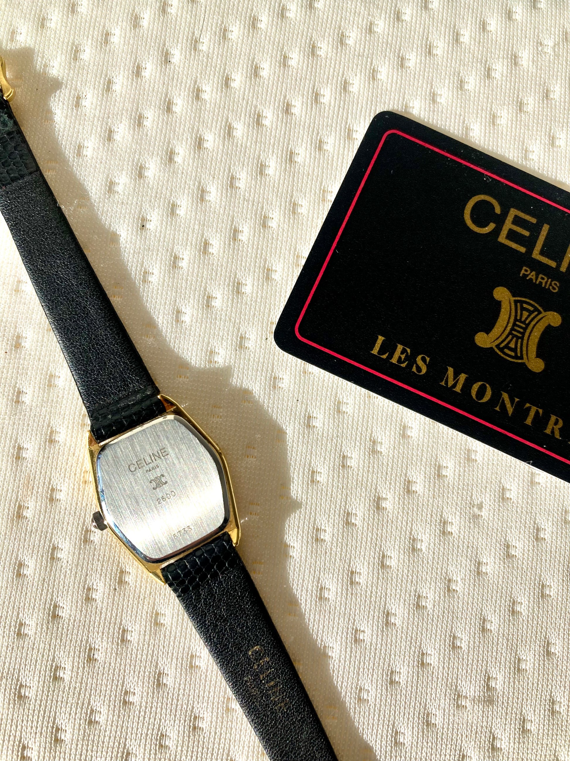 CELINE Black x Gold Hexagon Horse Carriage Watch
