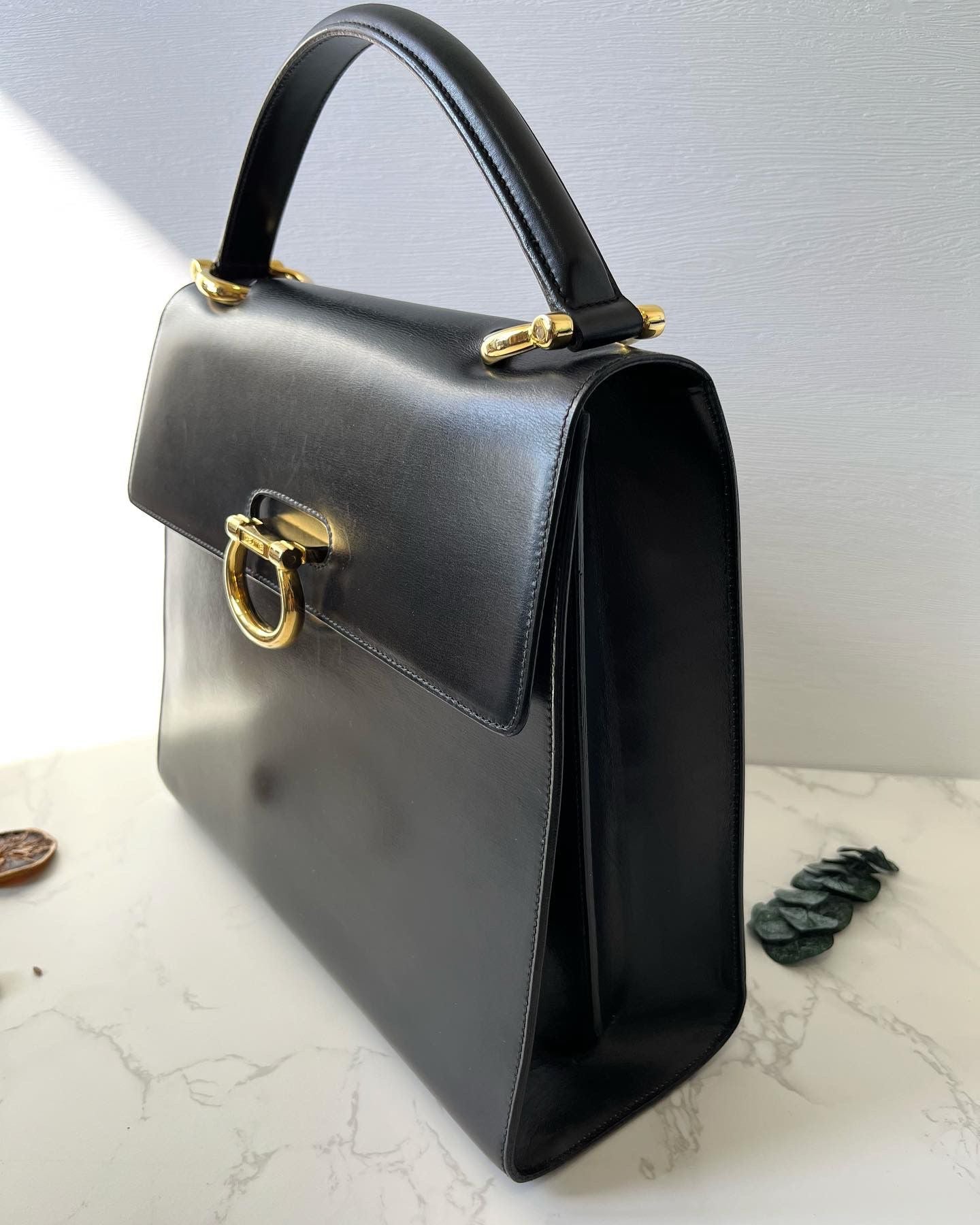 CELINE Black x Gold Horseshoe Leather Handbag