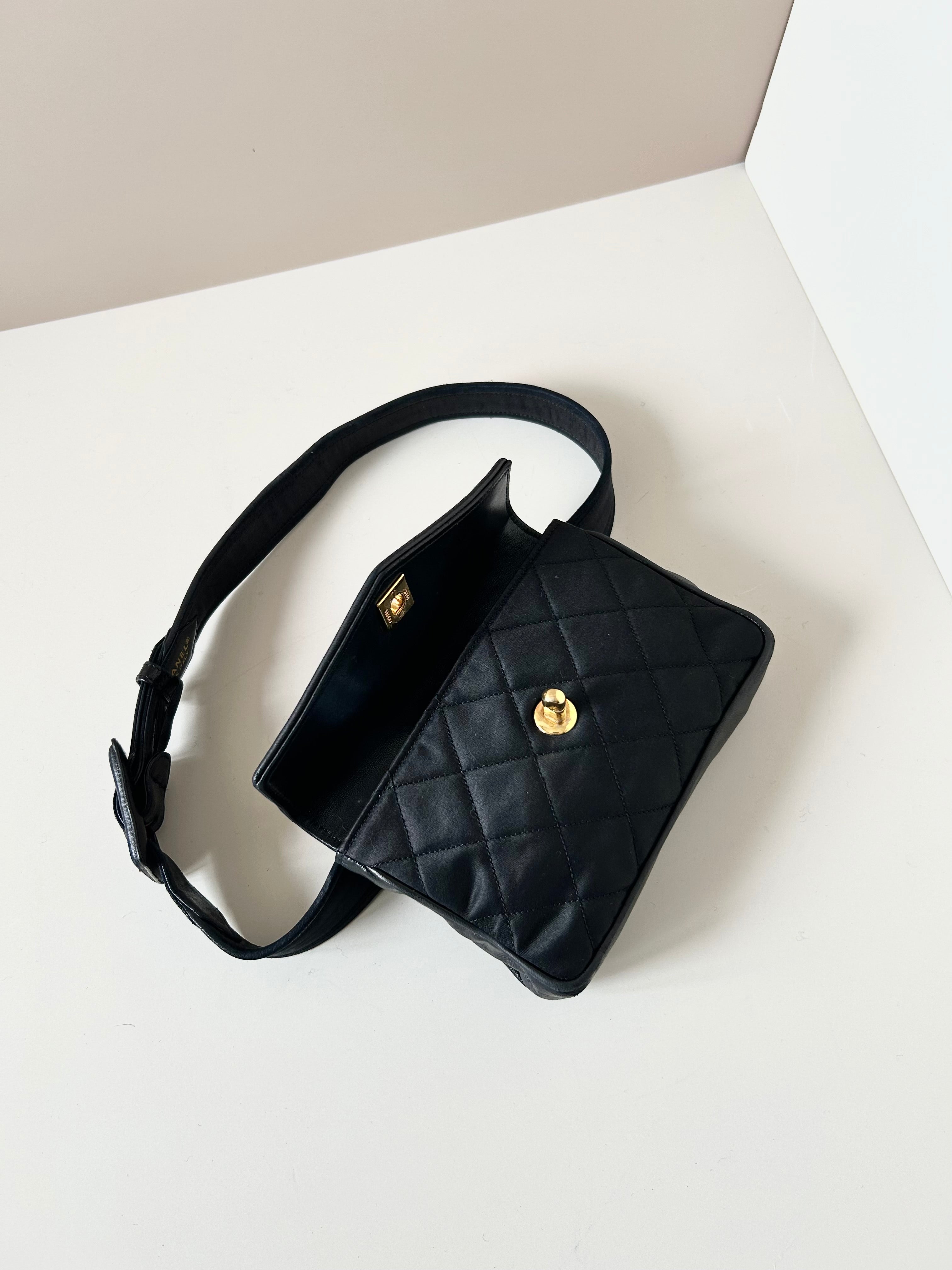 CHANEL rare black leather patchwork gold buckle belt bag / side bag / oblique bag