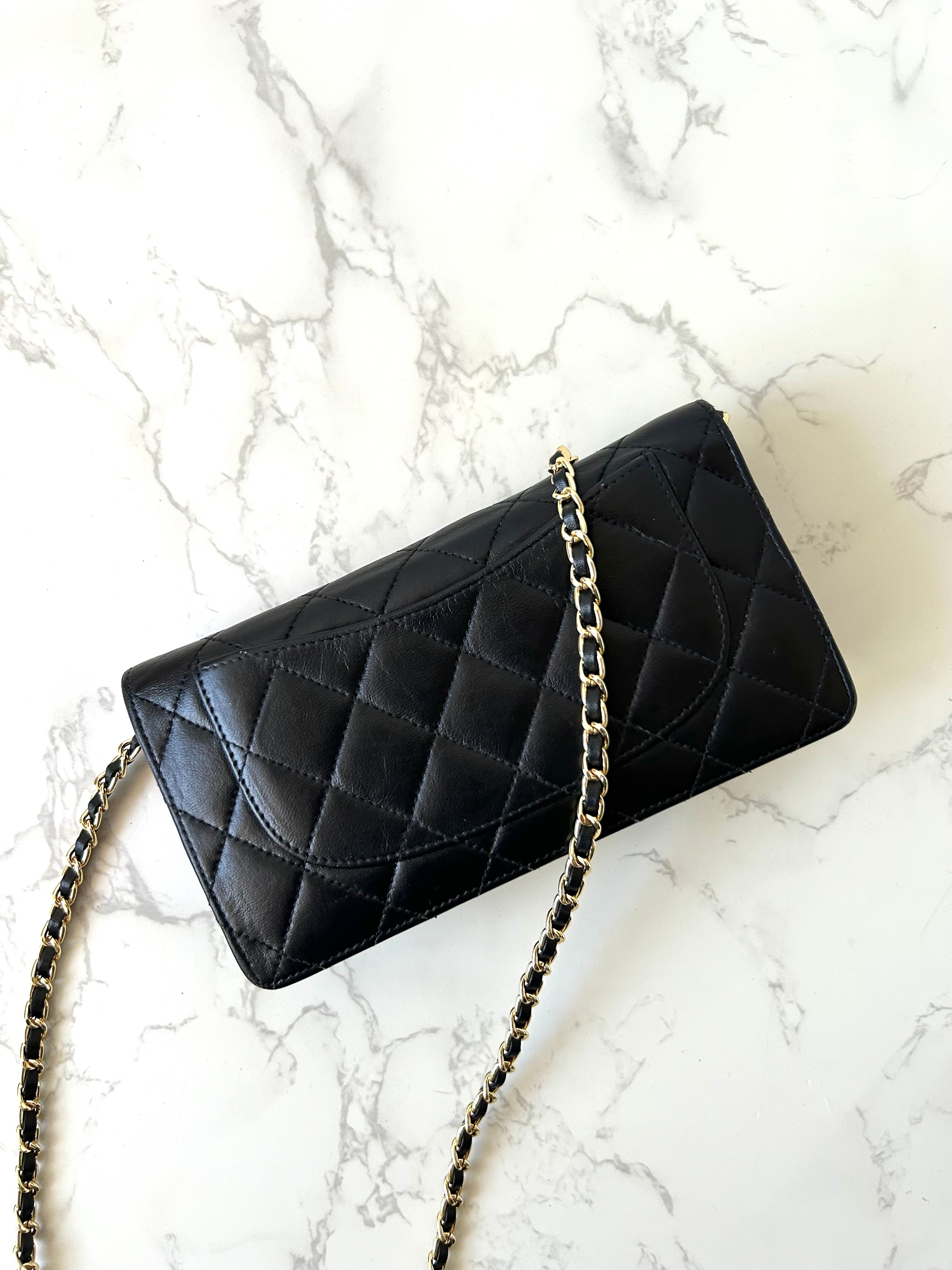 CHANEL black gold lambskin leather WOC long wallet/oblique bag/side bag