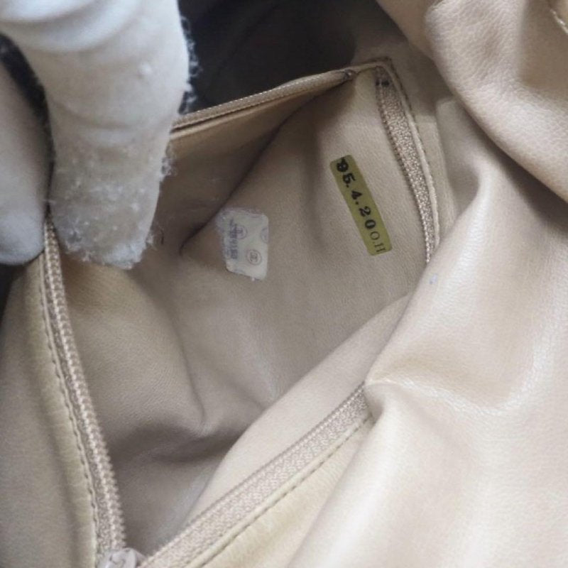 CHANEL rare beige lambskin double gold ball drawstring small bucket / side bag