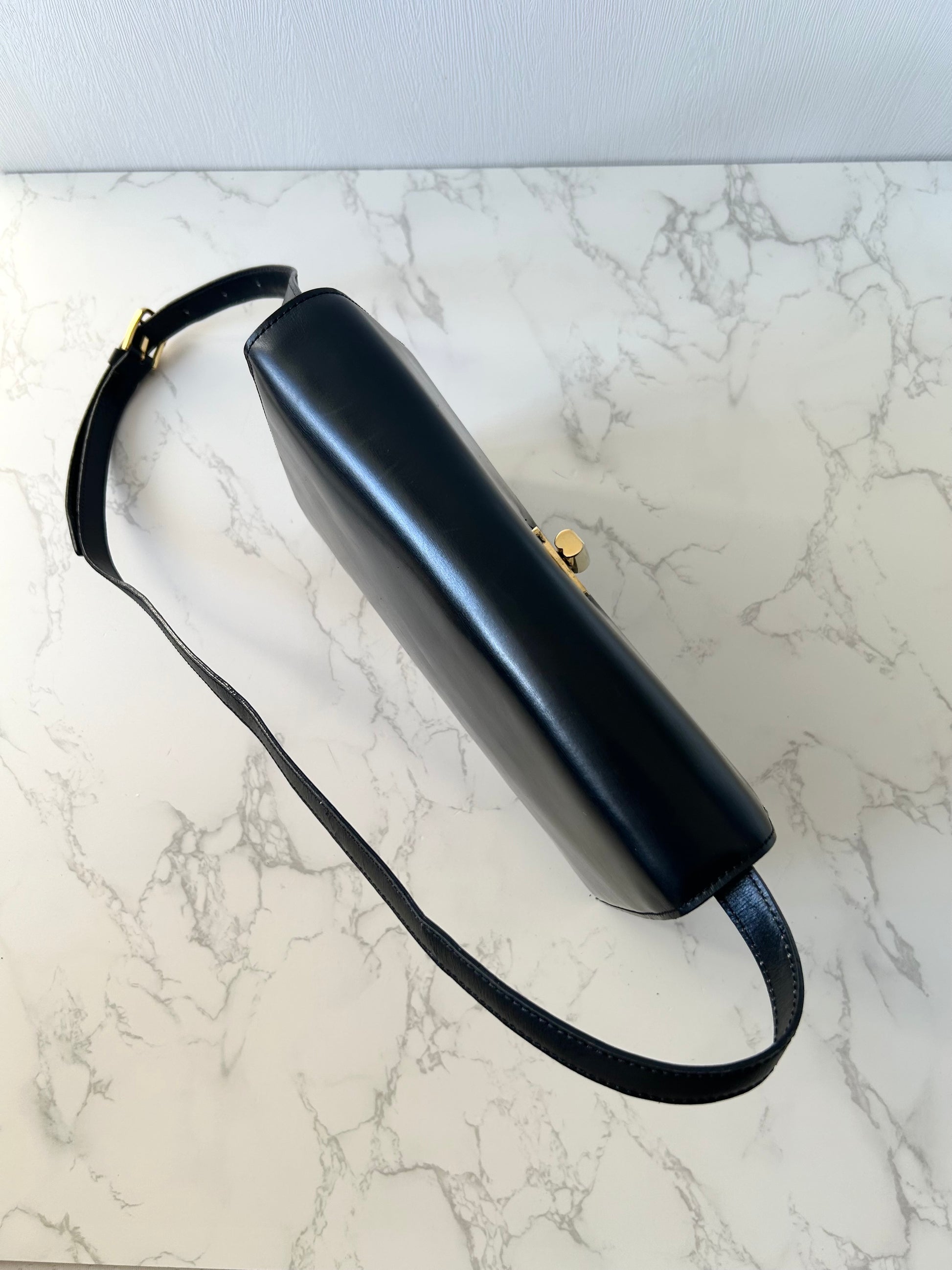 CELINE rare black cross rotating gold buckle leather small shoulder bag / crossbody bag