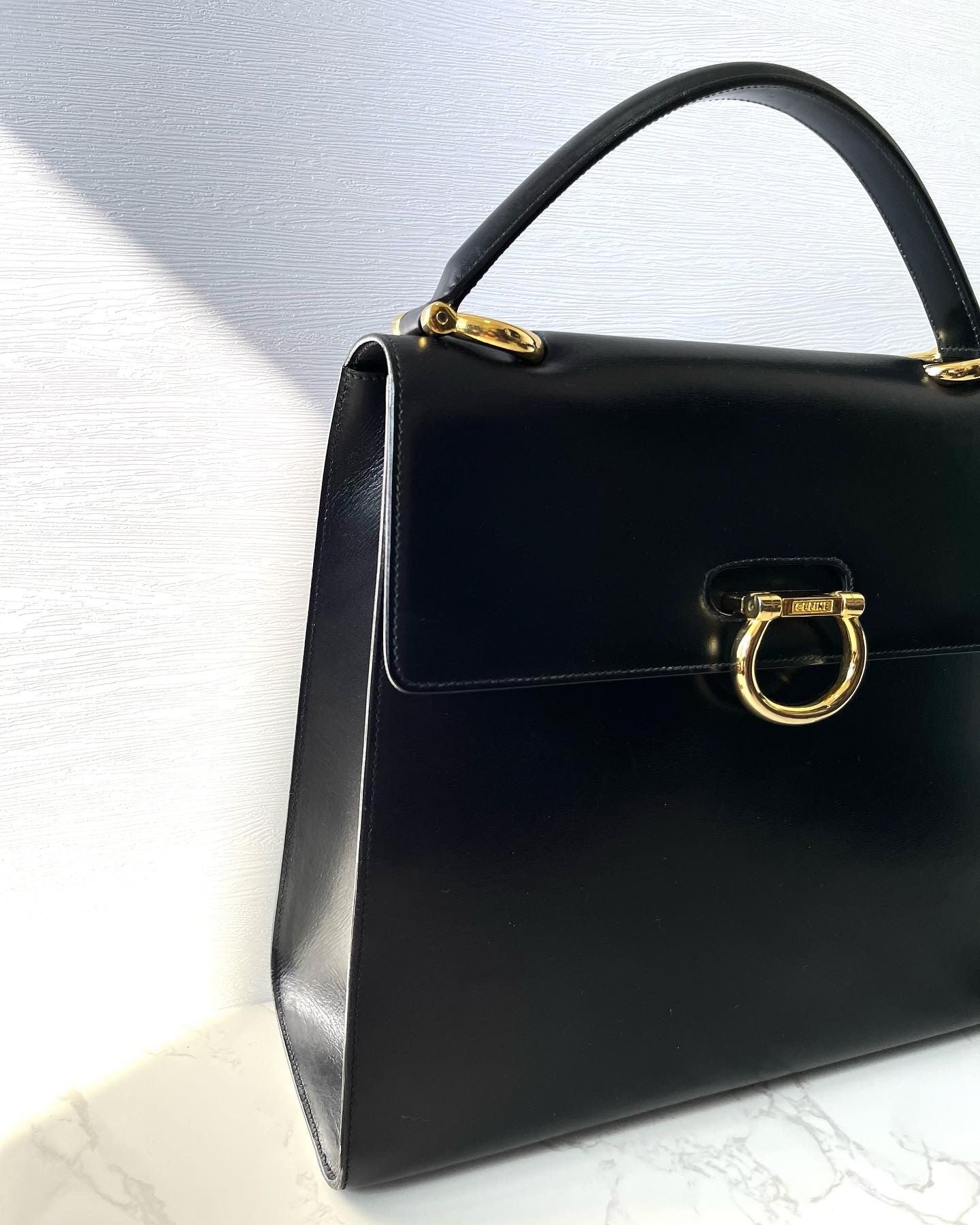 CELINE Black x Gold Horseshoe Leather Handbag