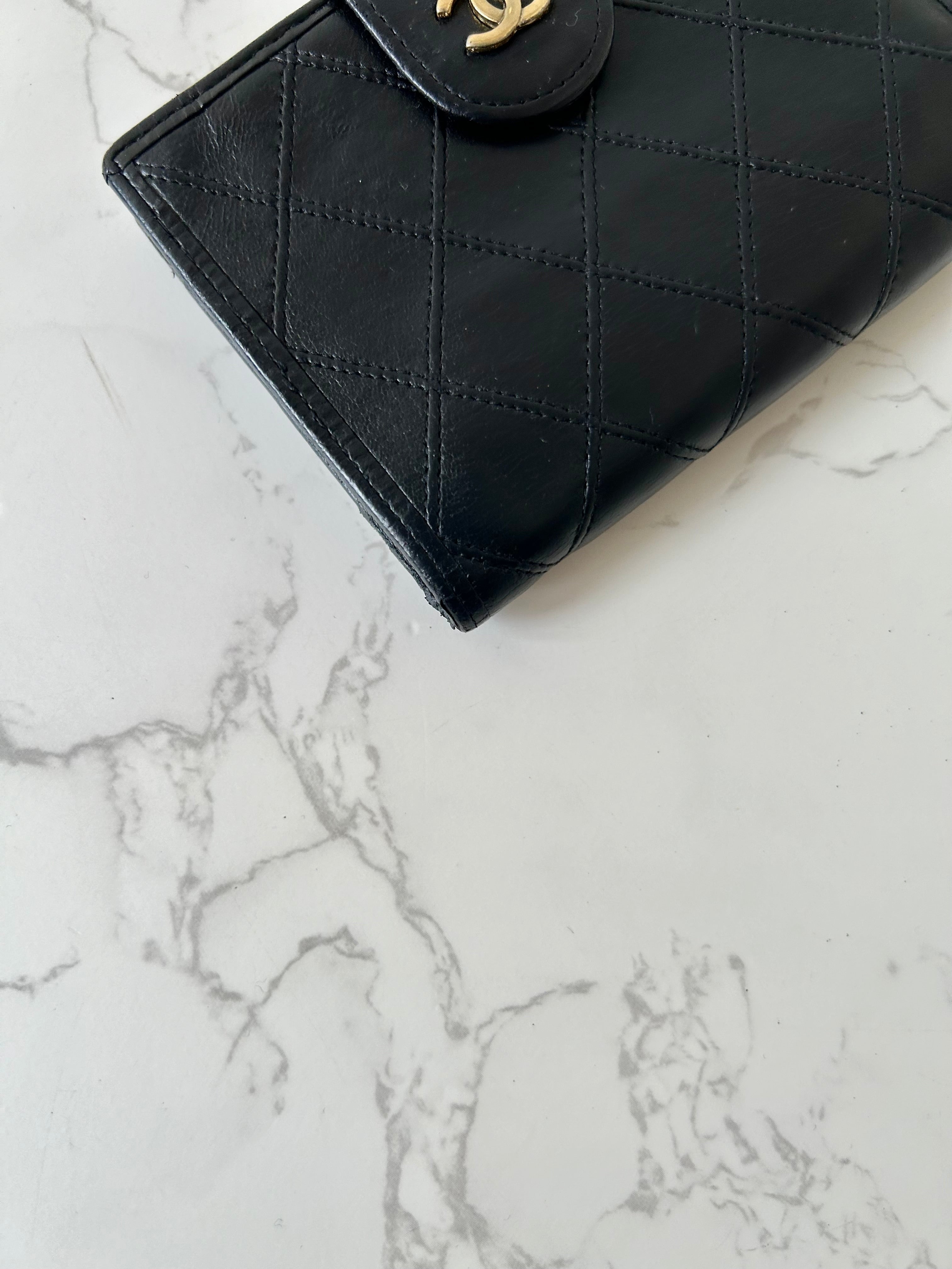 CHANEL rare black lambskin leather large gold buckle gold label short wallet / wallet