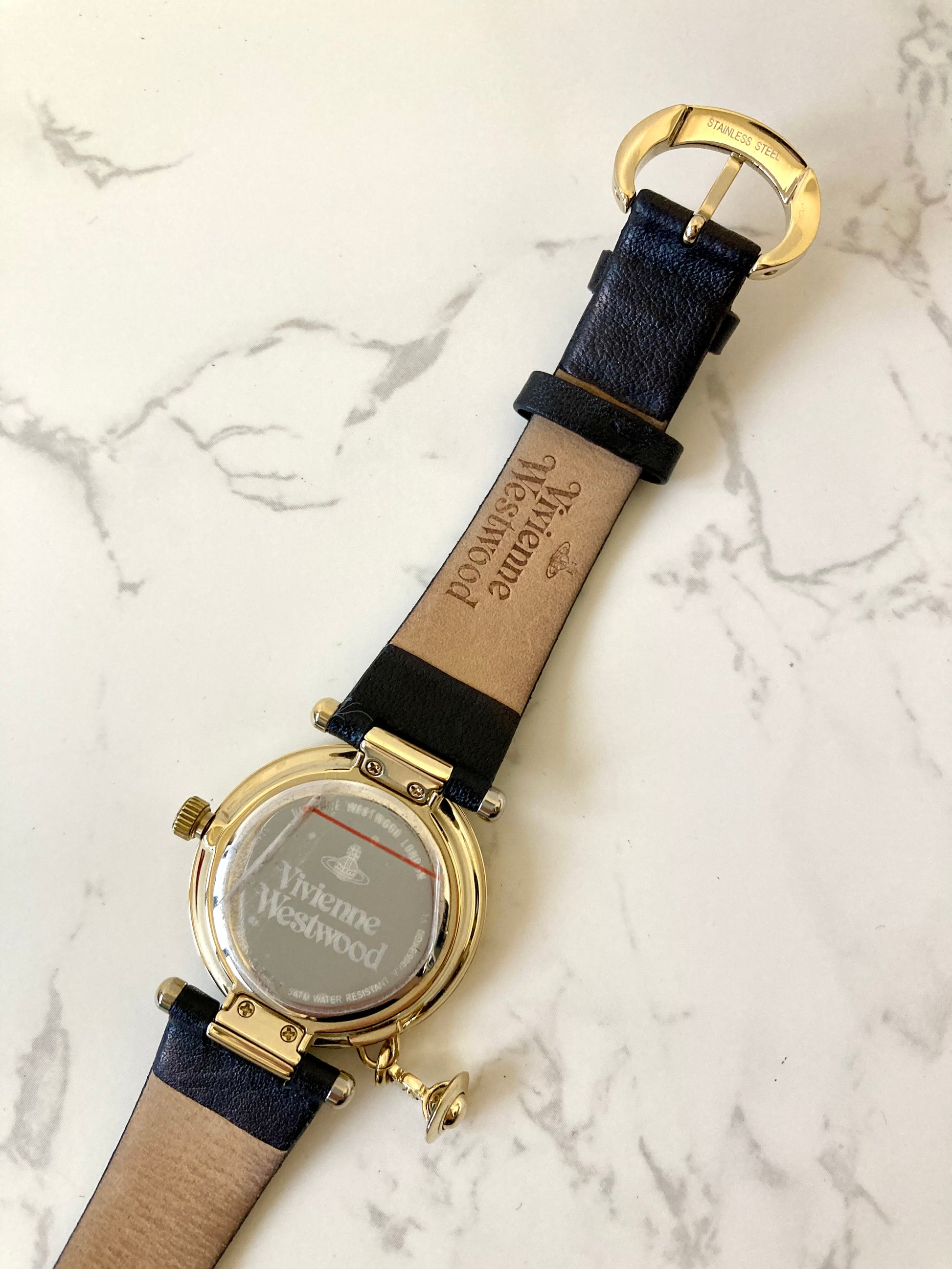 VIVIENNE WESTWOOD Black x Gold Unisex Quartz Watch with Planet Accessory