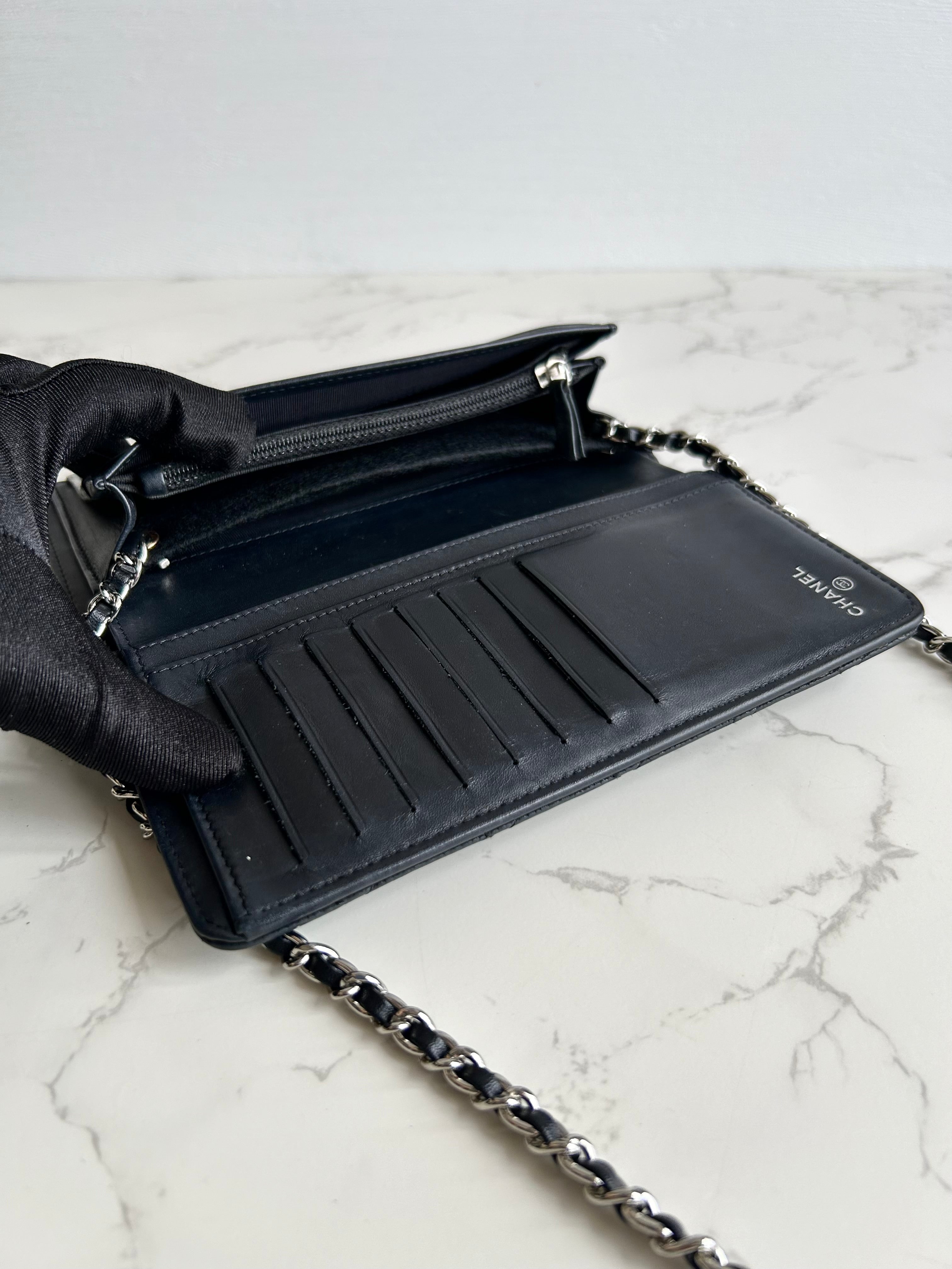 CHANEL black silver buckle caviar leather WOC long wallet / oblique bag / side bag