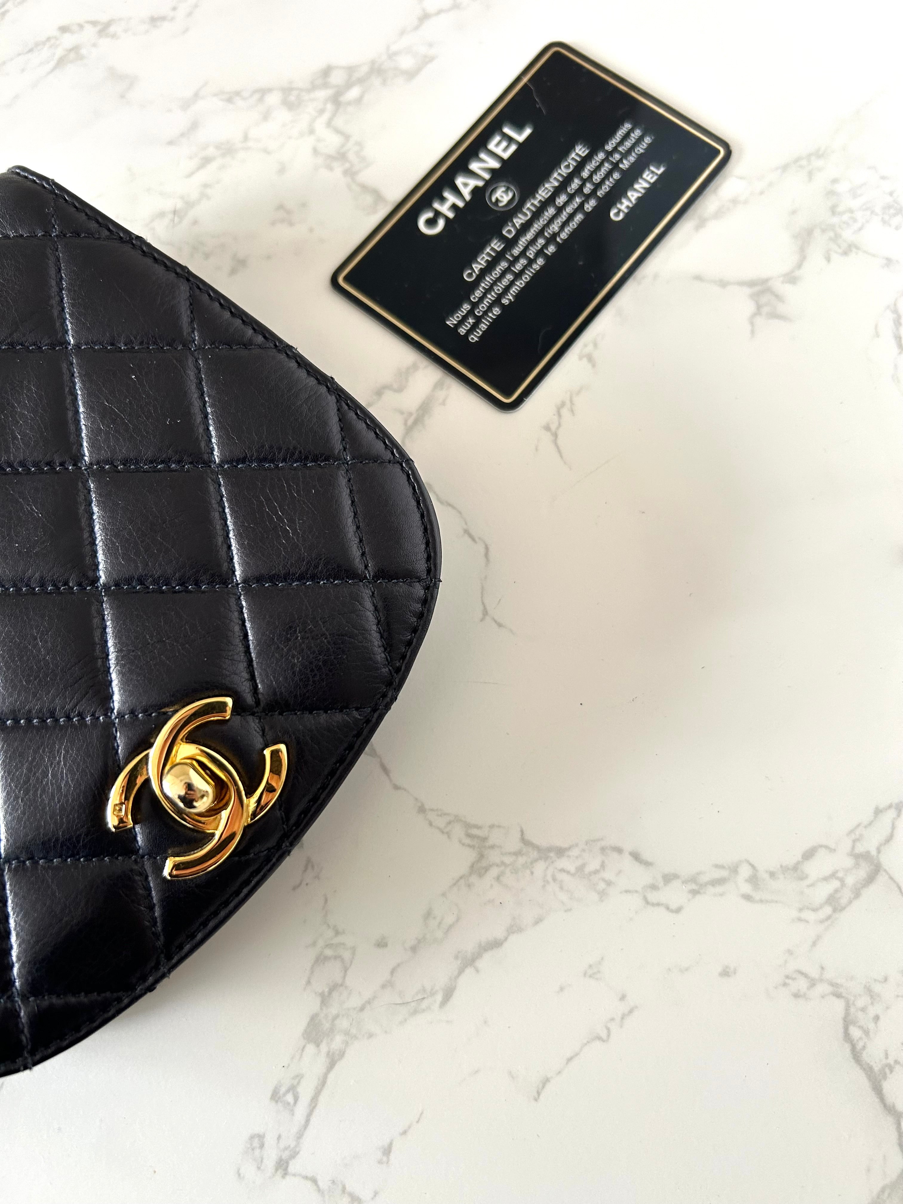 CHANEL rare black lambskin leather swivel buckle saddle bag / clutch / oblique bag