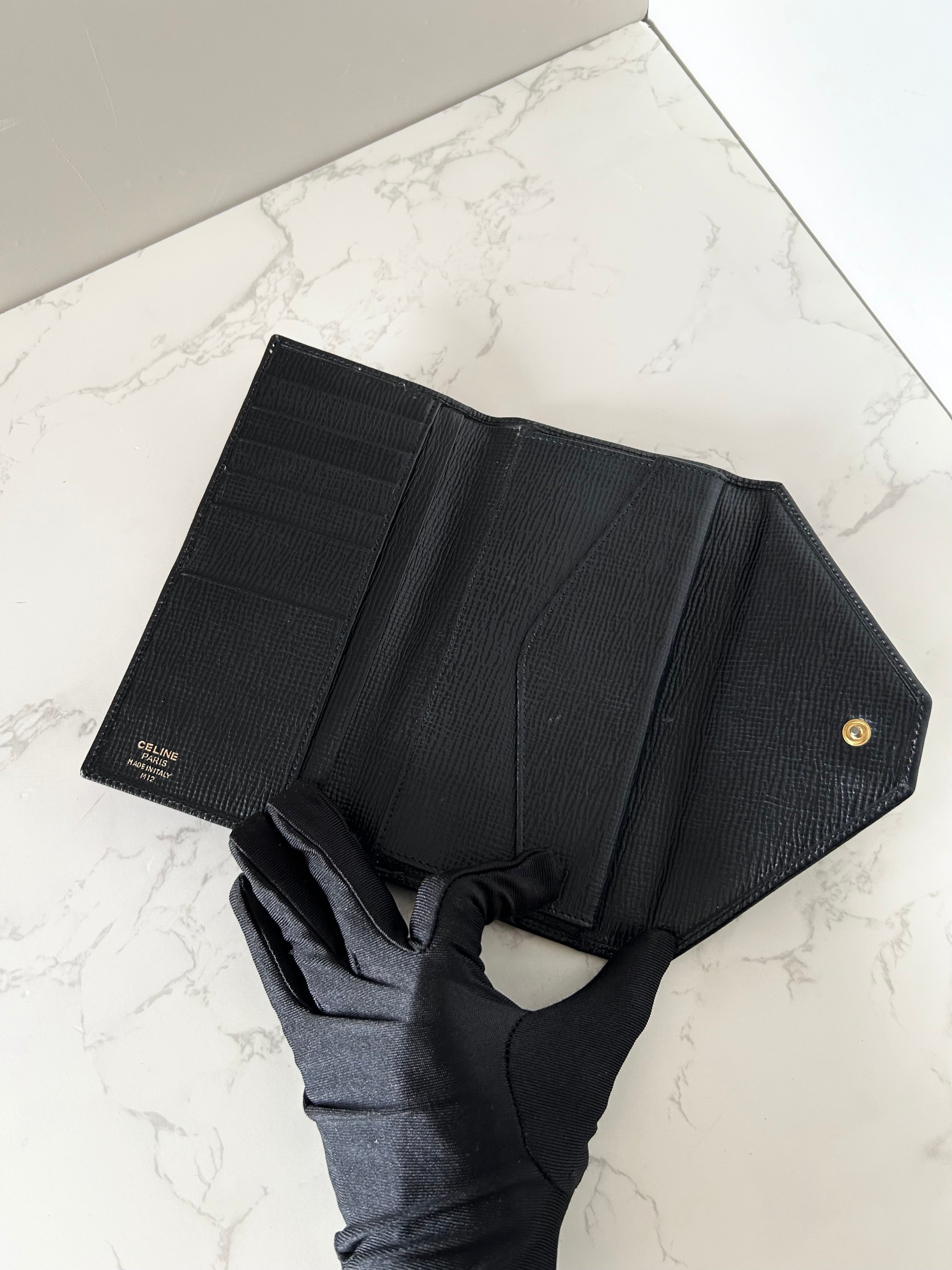 CELINE black gold ring leather long wallet / wallet
