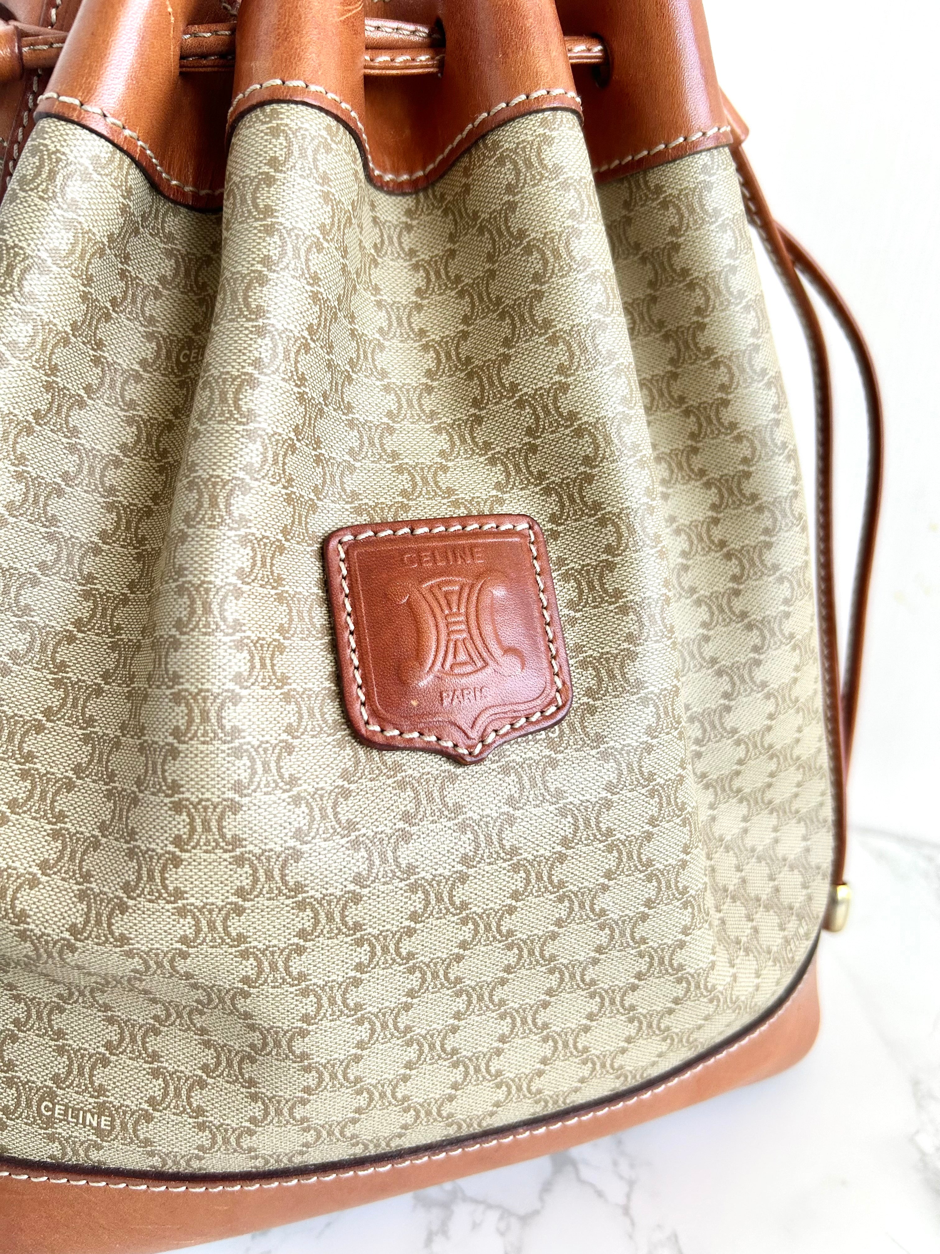 CELINE beige old flower leather shoulder drawstring bucket bag / side backpack