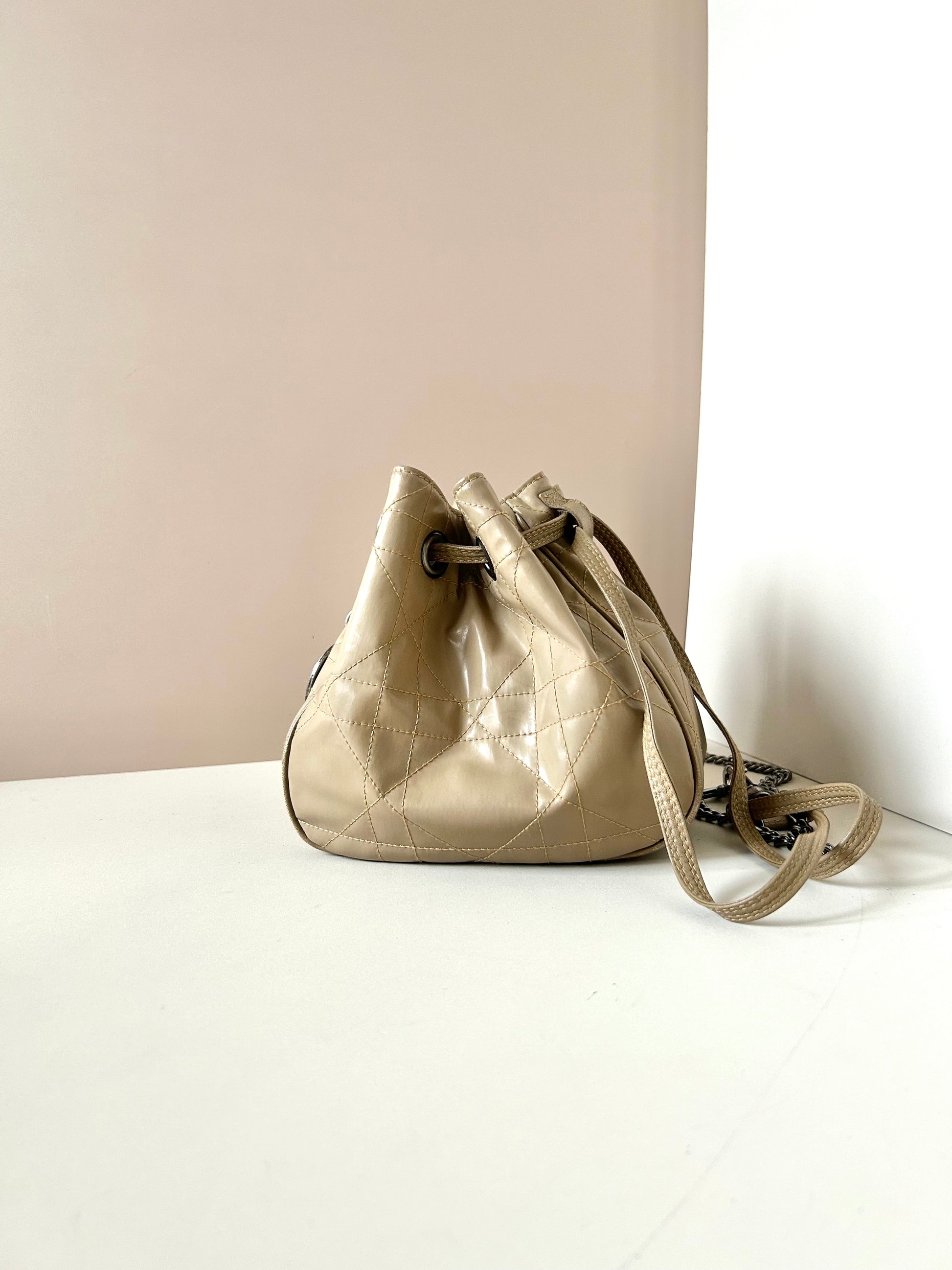 CHRISTIAN DOR beige leather silver buckle drawstring small bucket bag / side backpack / shoulder bag