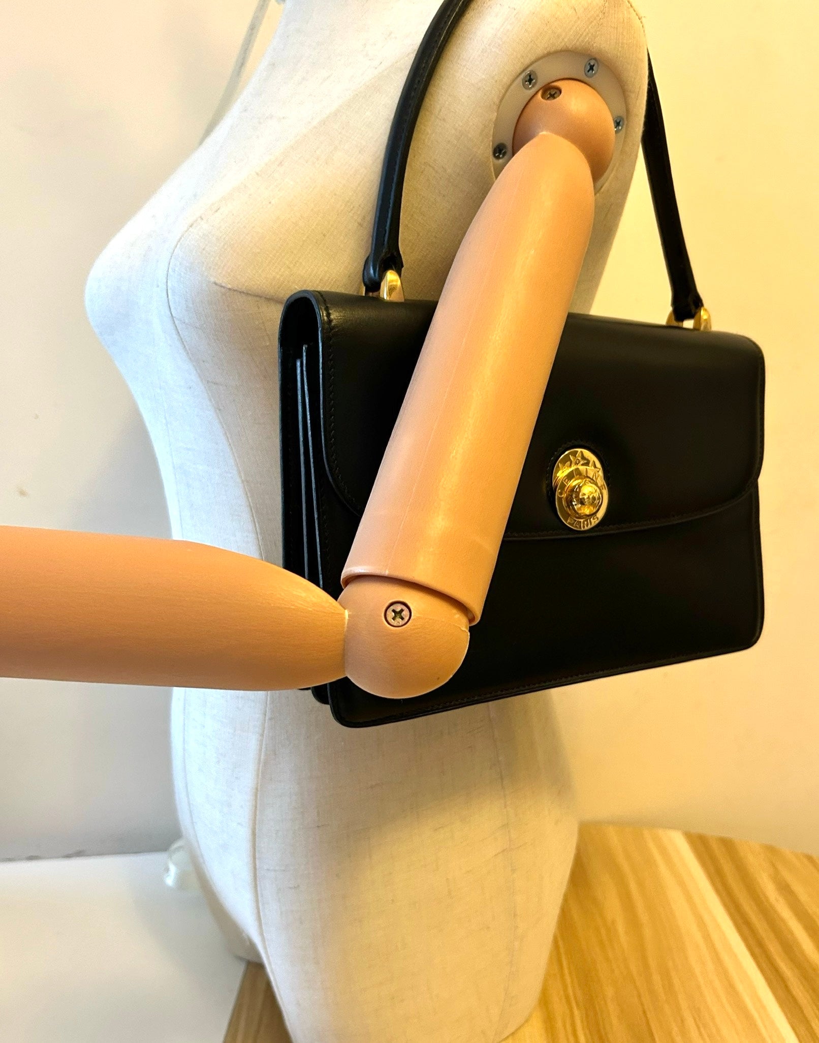 CELINE rare rotating golden planet black leather small bag / side backpack / underarm bag