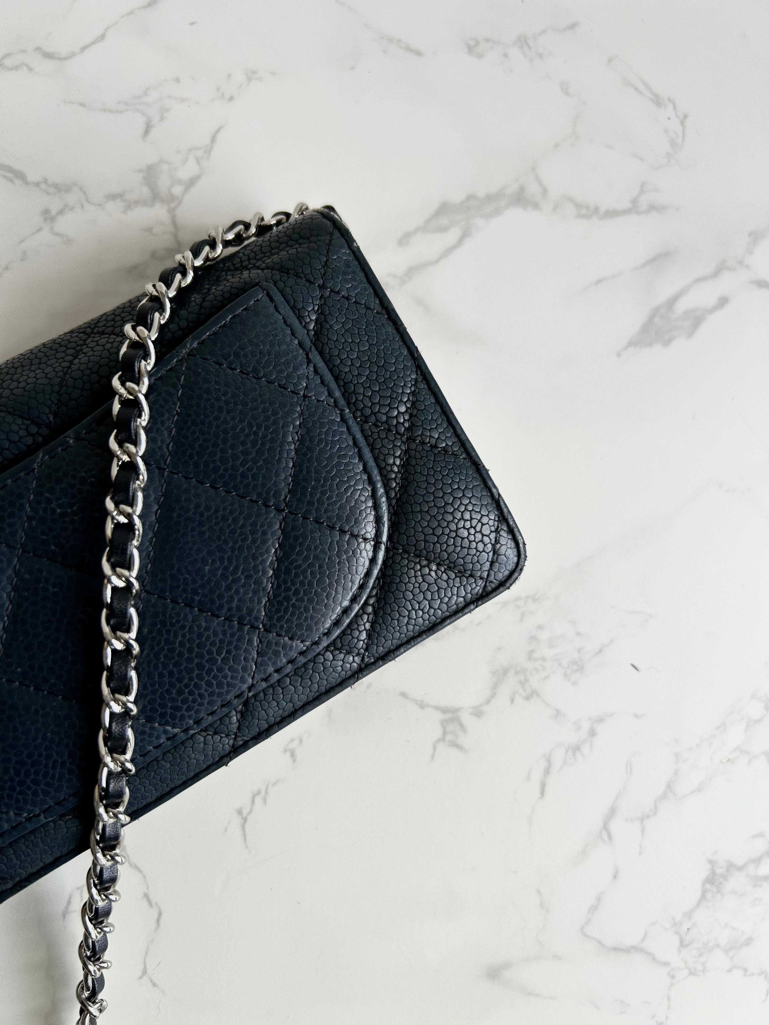 CHANEL black silver buckle caviar leather WOC long wallet / oblique bag / side bag