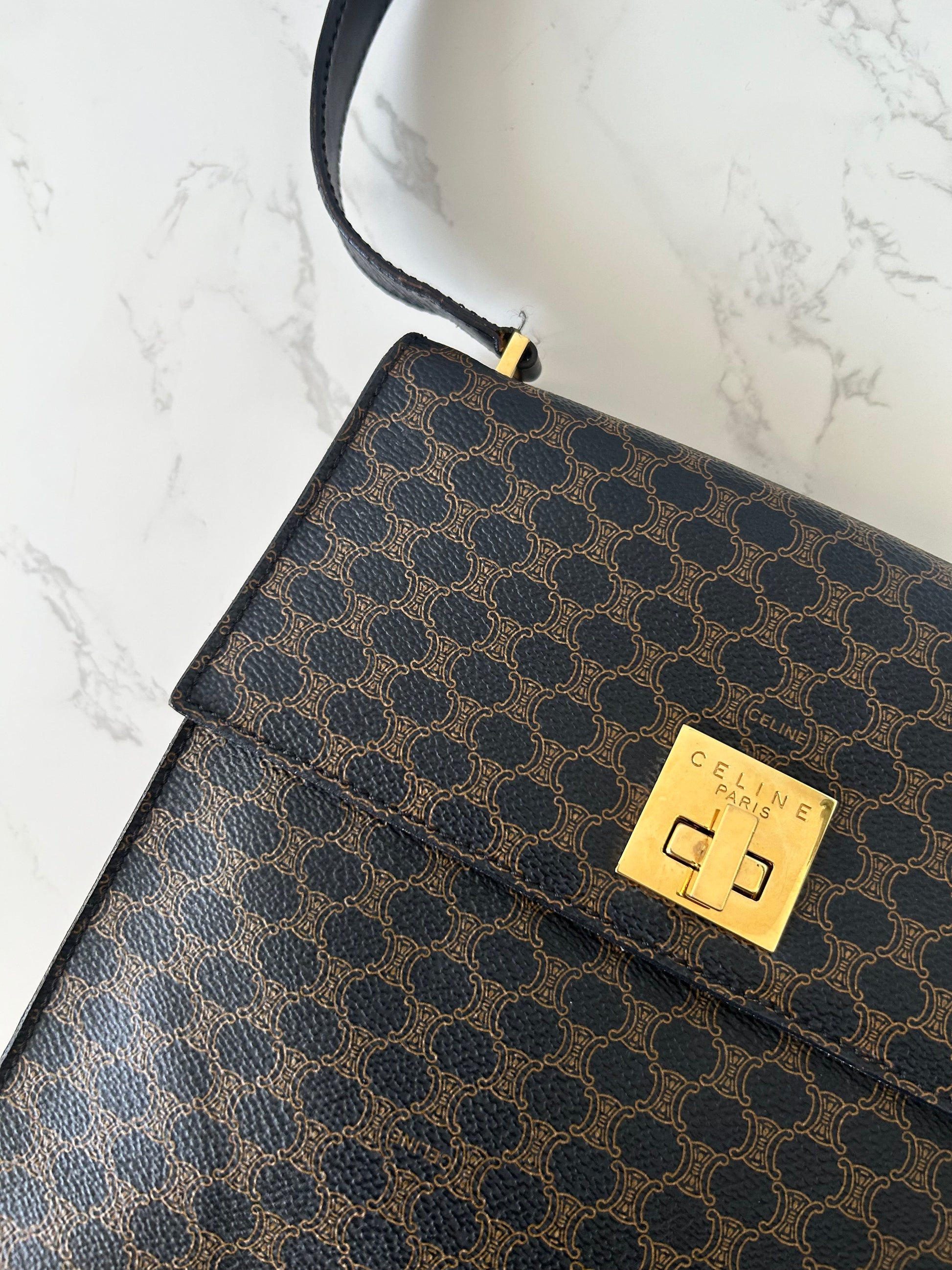 CELINE rare black old flower gold rotating buckle leather Kelly side bag / oblique bag