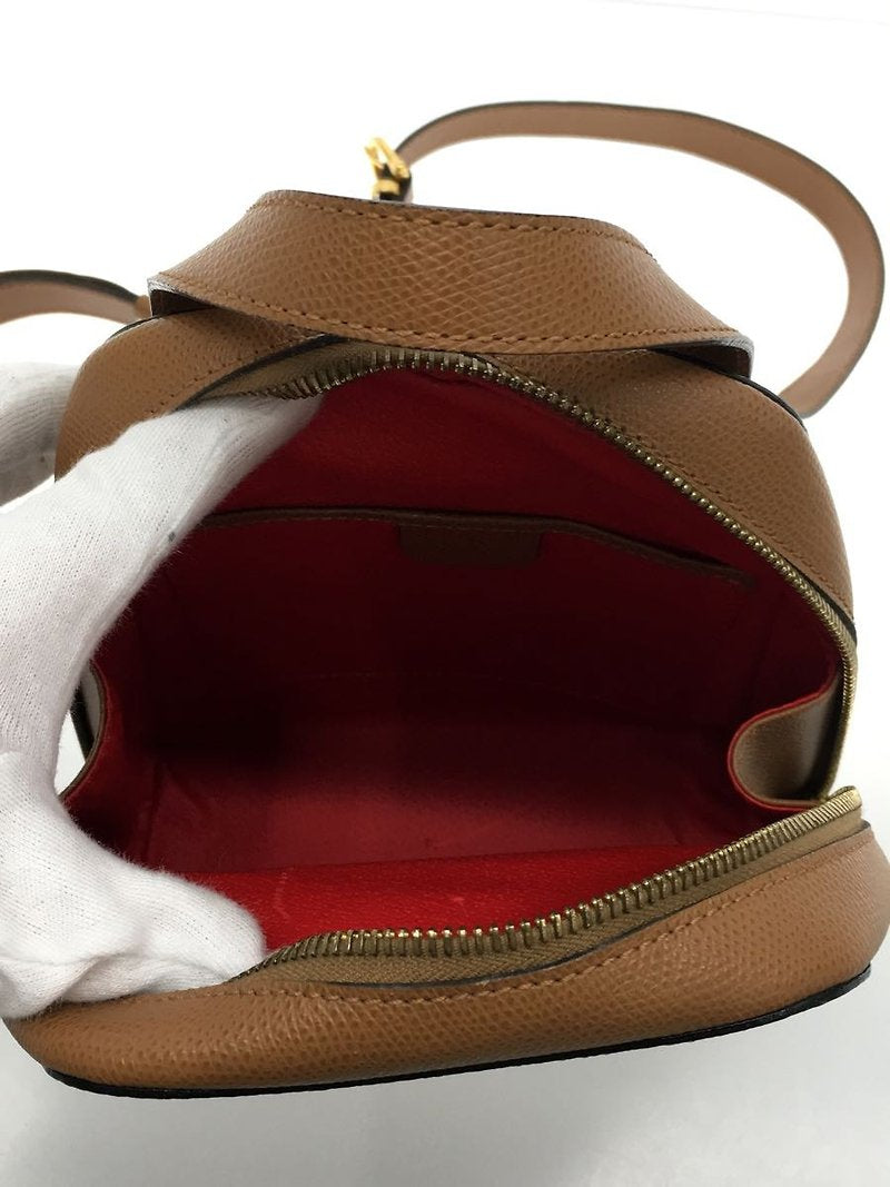 CELINE rare caramel brown cross rotating gold buckle leather small backpack / rucksack / backpack