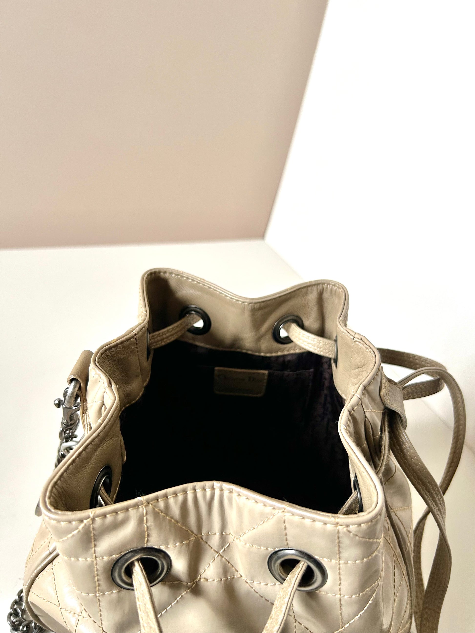 CHRISTIAN DOR beige leather silver buckle drawstring small bucket bag / side backpack / shoulder bag