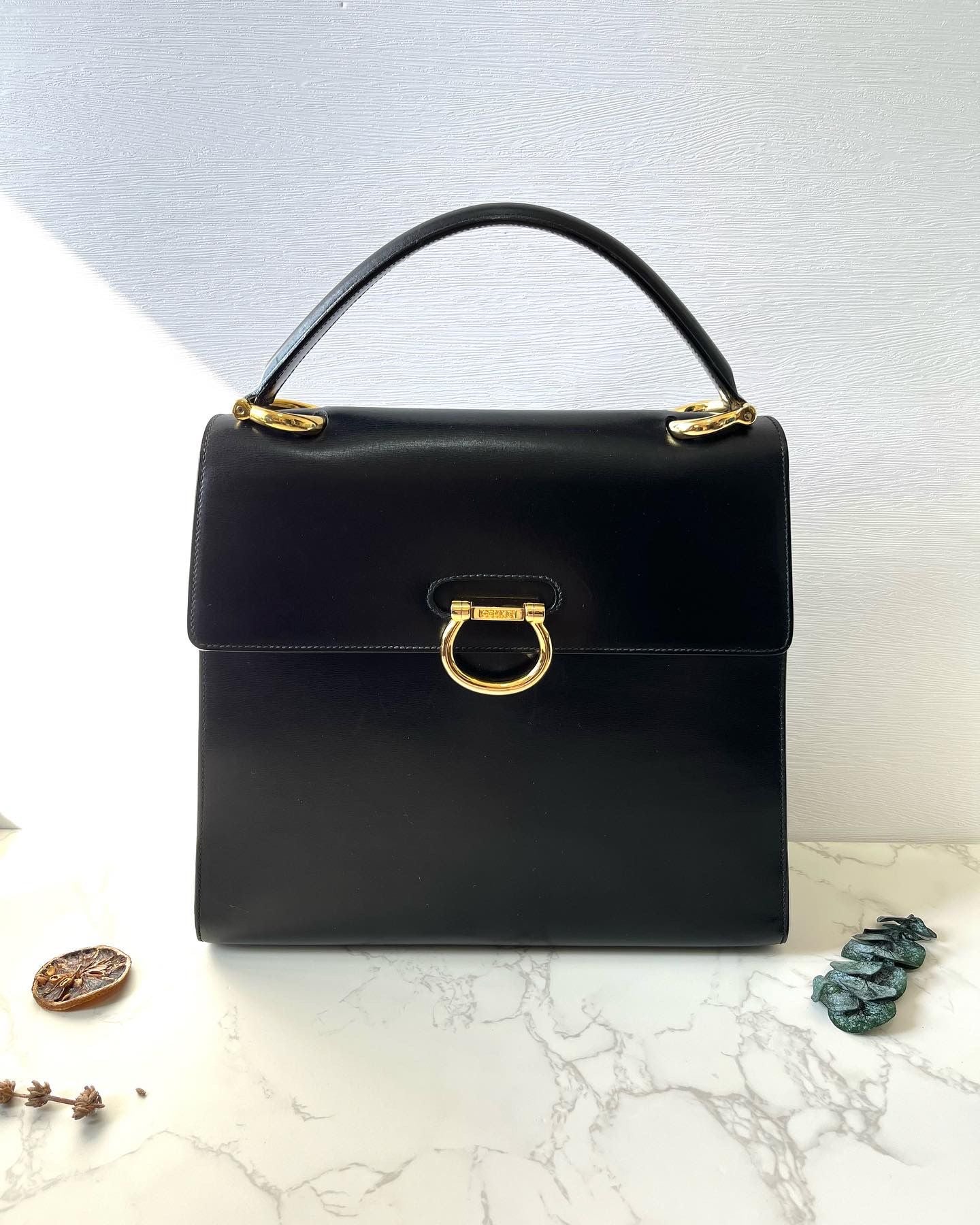 CELINE Black x Gold Horseshoe Leather Handbag