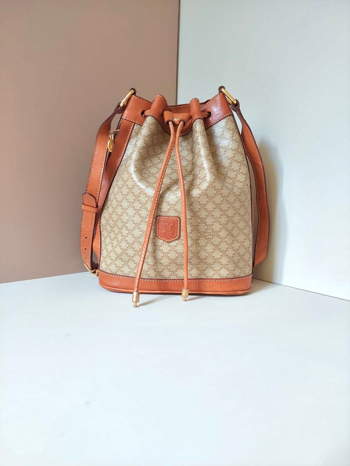CELINE beige old flower leather shoulder drawstring bucket bag / side backpack / shoulder bag