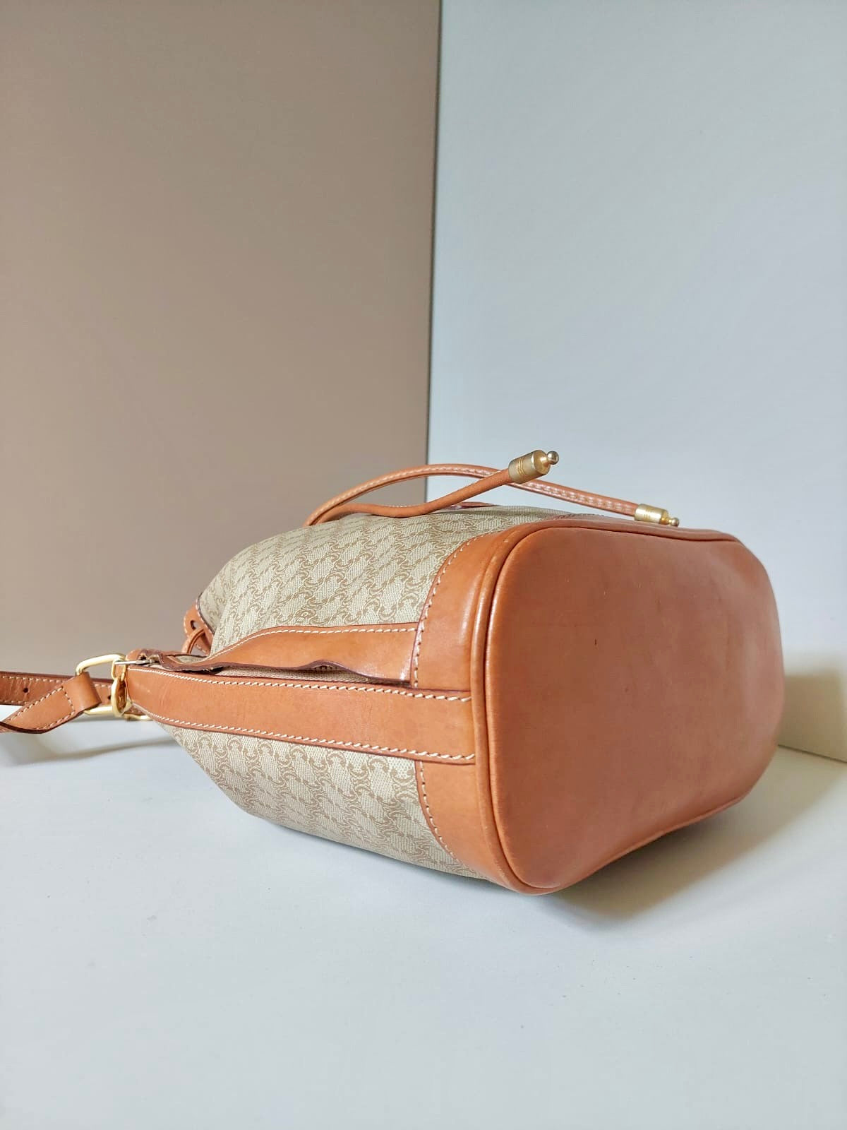 CELINE beige old flower leather shoulder drawstring bucket bag / side backpack / shoulder bag