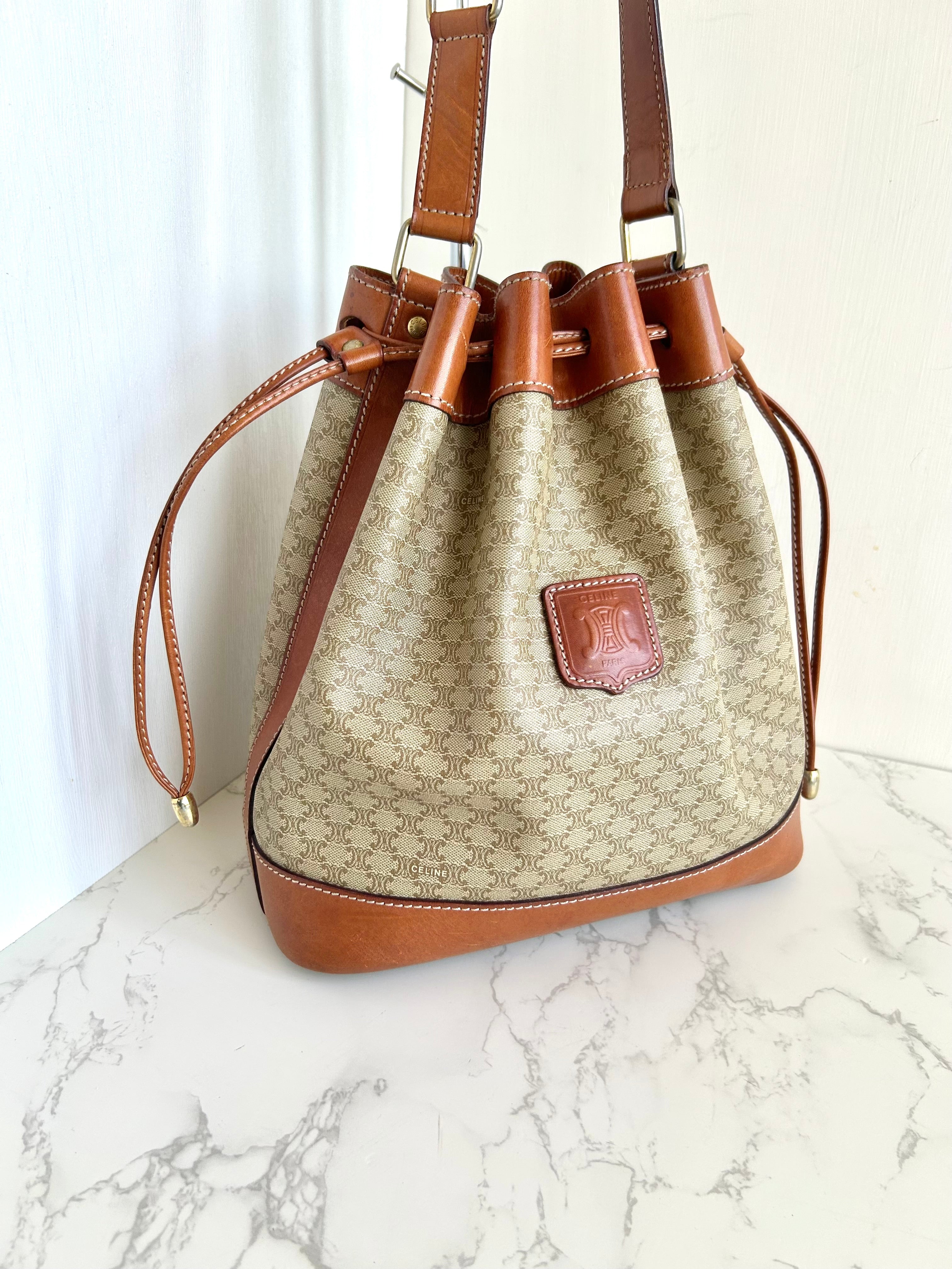 CELINE beige old flower leather shoulder drawstring bucket bag / side backpack
