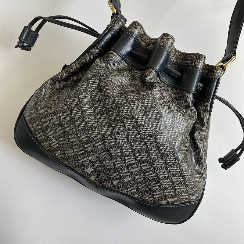 CELINE rare black old flower gold Arc de Triomphe leather shoulder drawstring bucket bag / side backpack