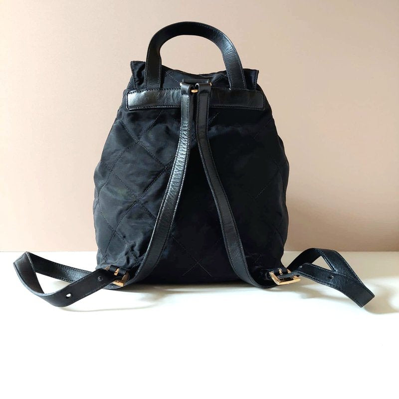 PRADA black gold triangle check nylon men's and women's backpack/backpack
