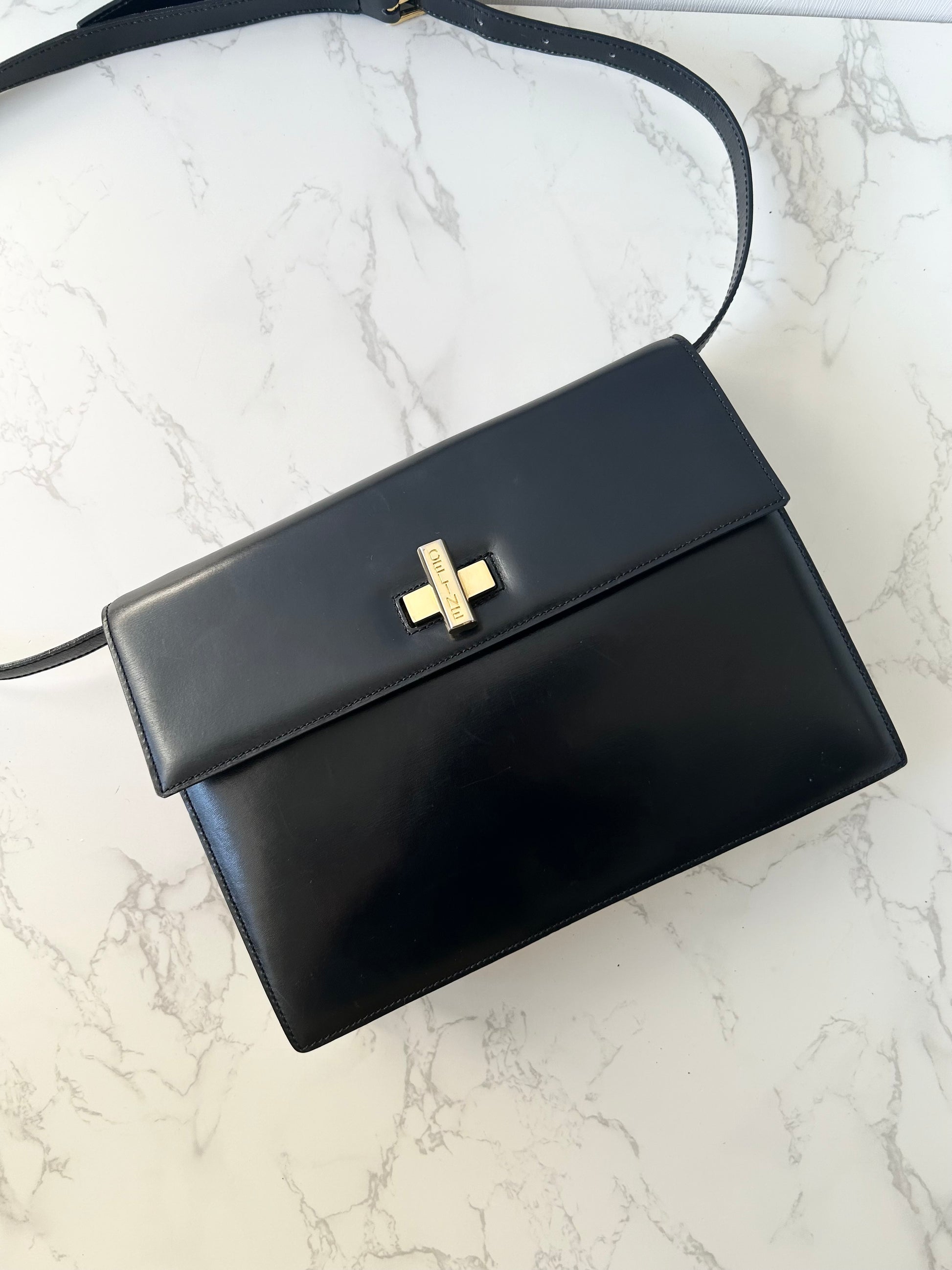 CELINE rare black cross rotating gold buckle leather small shoulder bag / crossbody bag