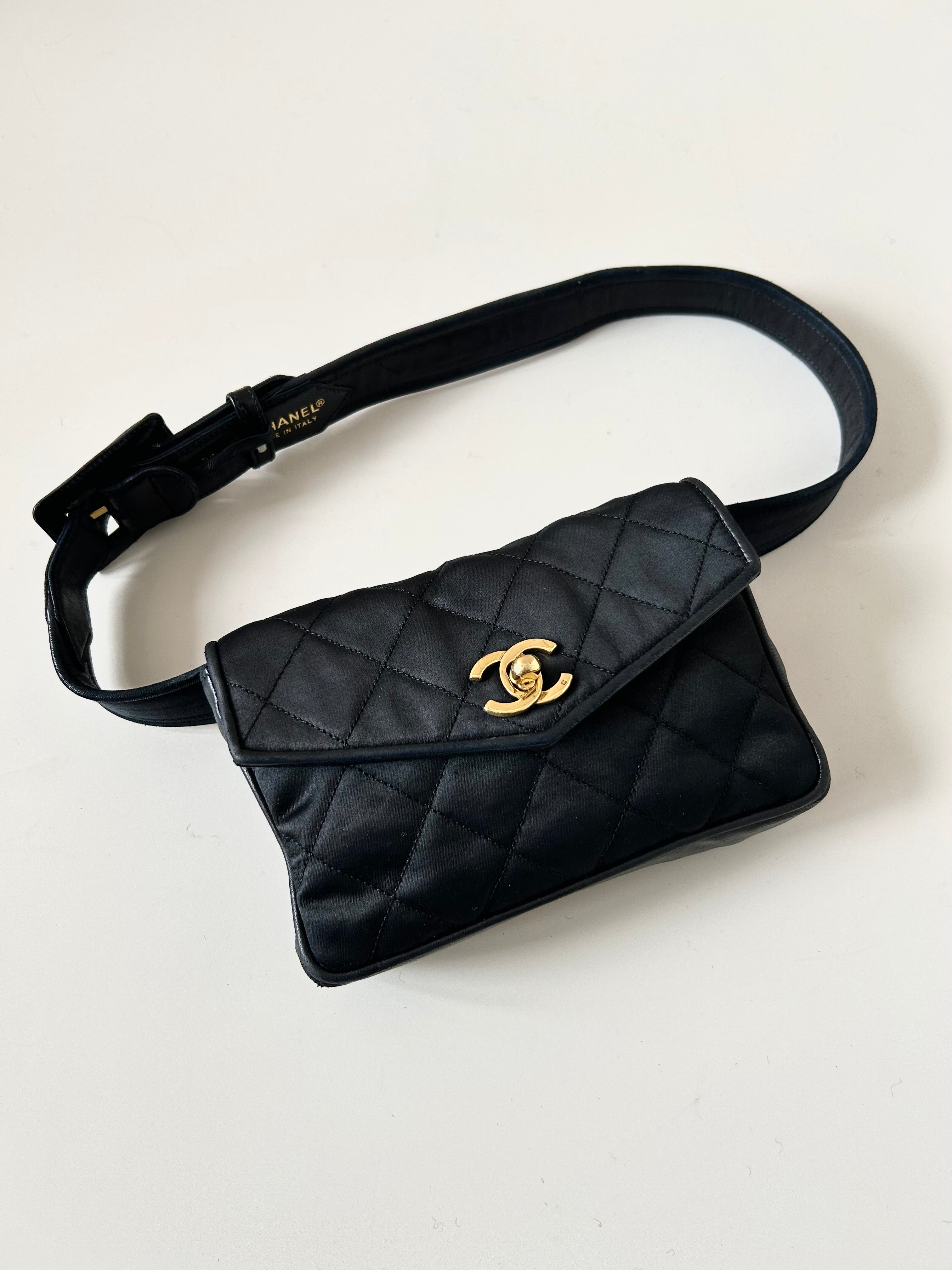 CHANEL rare black leather patchwork gold buckle belt bag / side bag / oblique bag