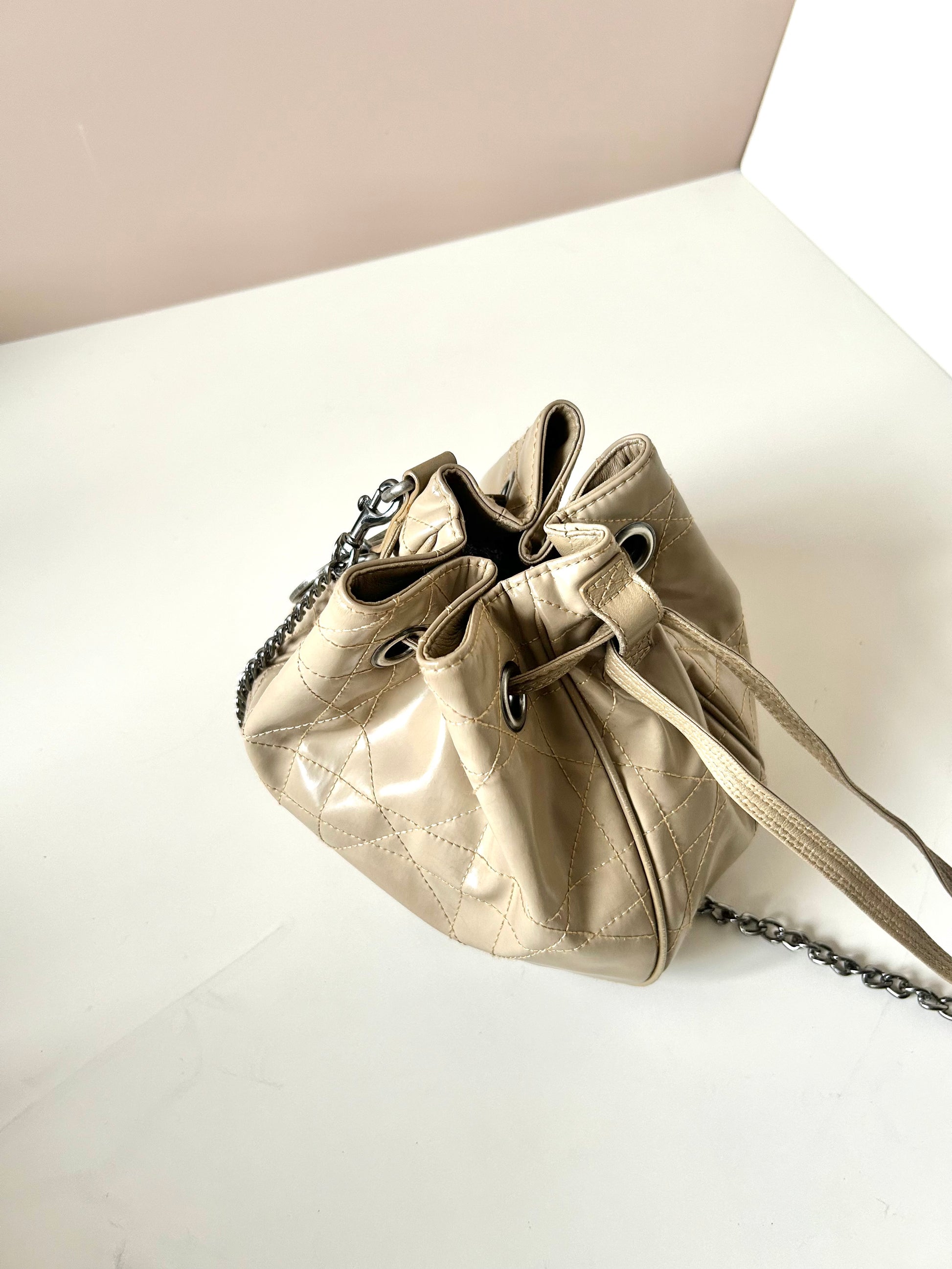 CHRISTIAN DOR beige leather silver buckle drawstring small bucket bag / side backpack / shoulder bag