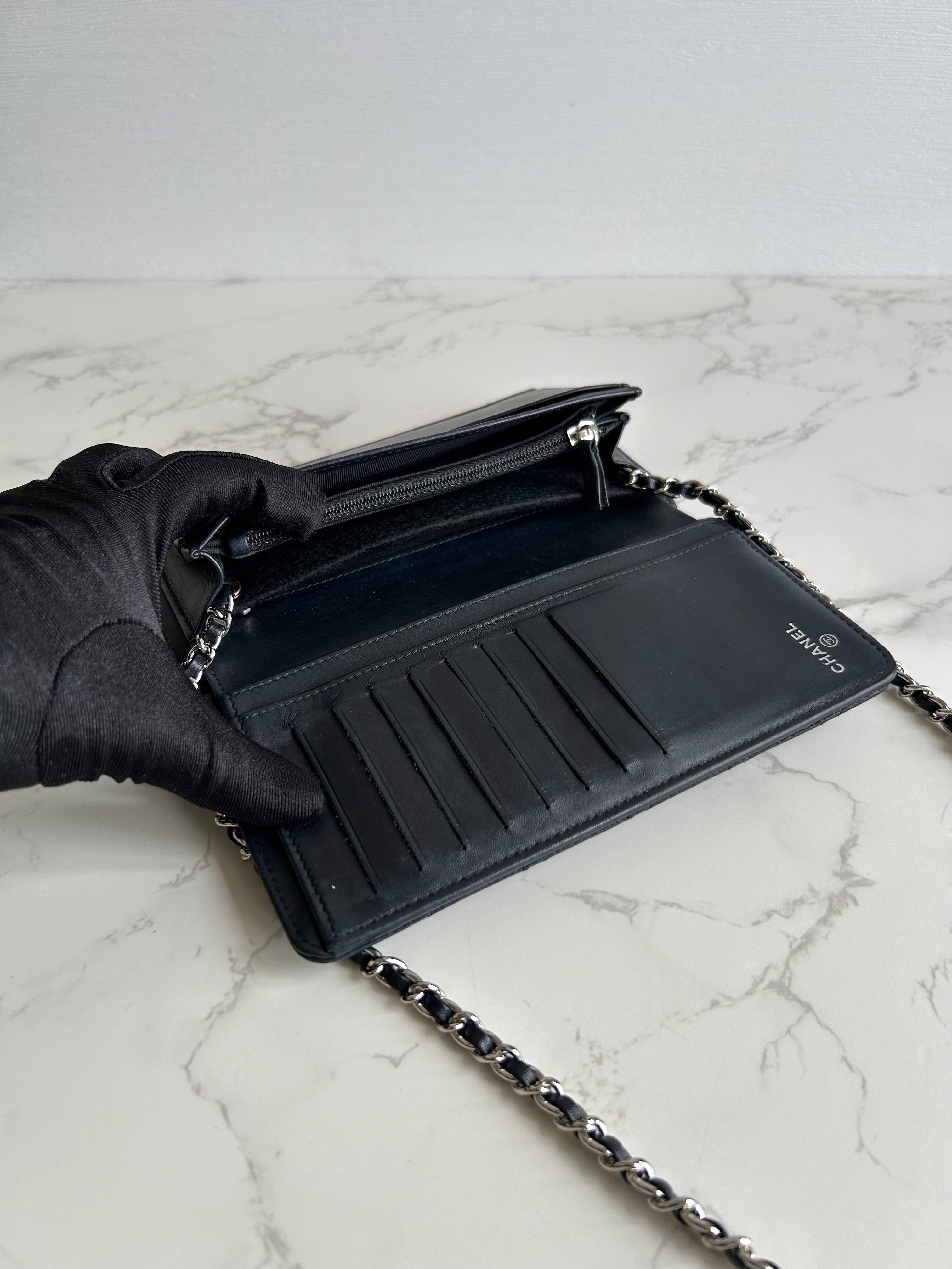 CHANEL black silver buckle caviar leather WOC long wallet / oblique bag / side bag