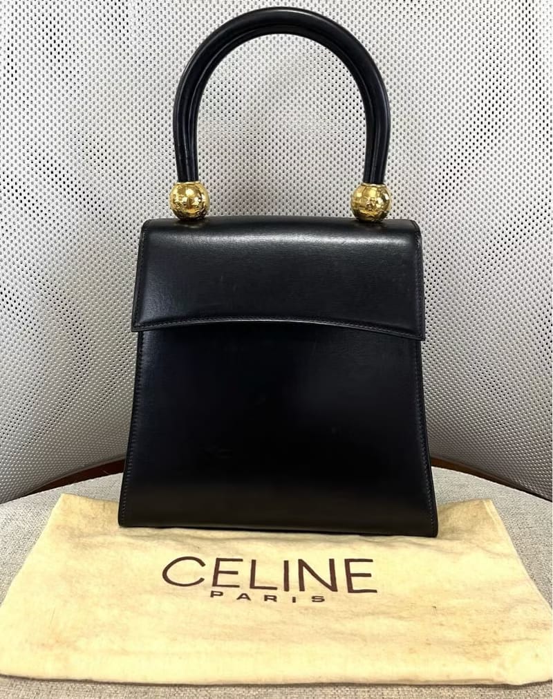 Rare second-hand Celine double gold planet black leather handbag