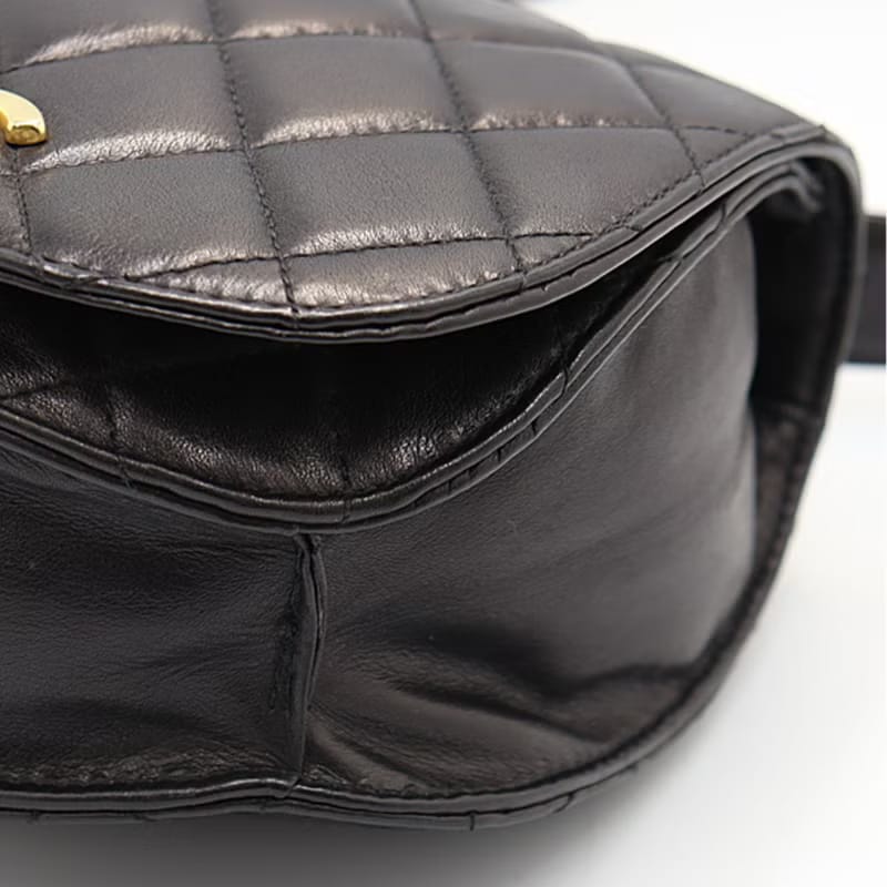 Rare second-hand Chanel black rotating gold buckle saddle shoulder bag/crossbody bag/side bag