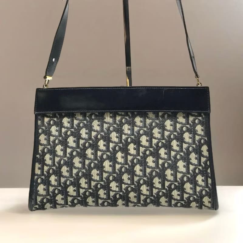 Dior dark blue old flower Kelly mouth gold antique shoulder bag / side backpack