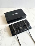 Chanel black WOC leather side bag/oblique bag/long clip