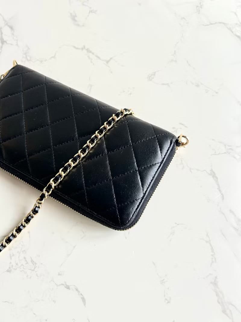 Chanel black WOC leather side bag/oblique bag/long clip