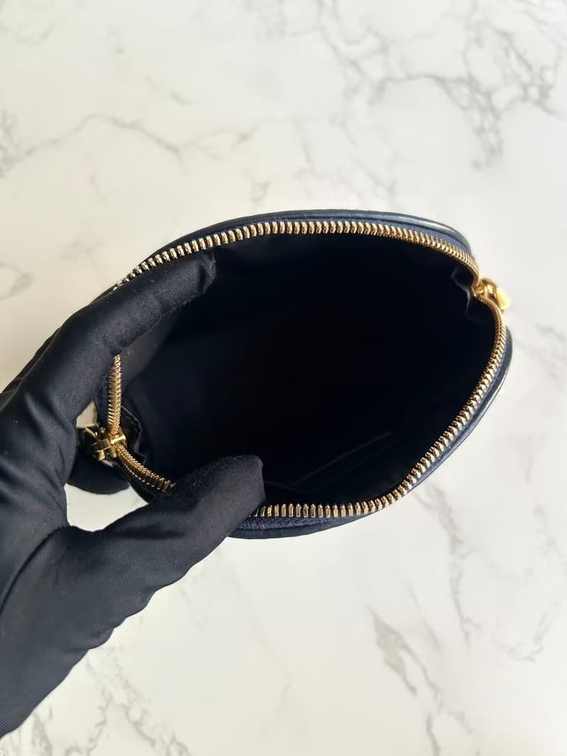 Christian Dior藍色老花30 Montaigne皮革包/化妝包/手拿包