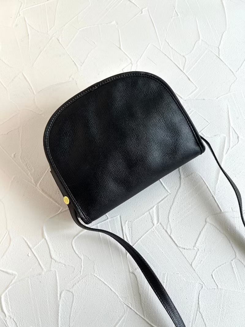Loewe black and gold saddle side backpack/oblique backpack/shoulder bag