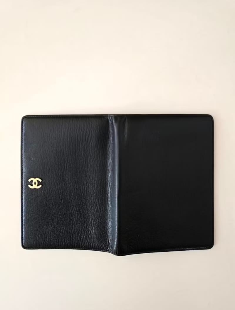 Chanel black leather midi/short clip/wallet