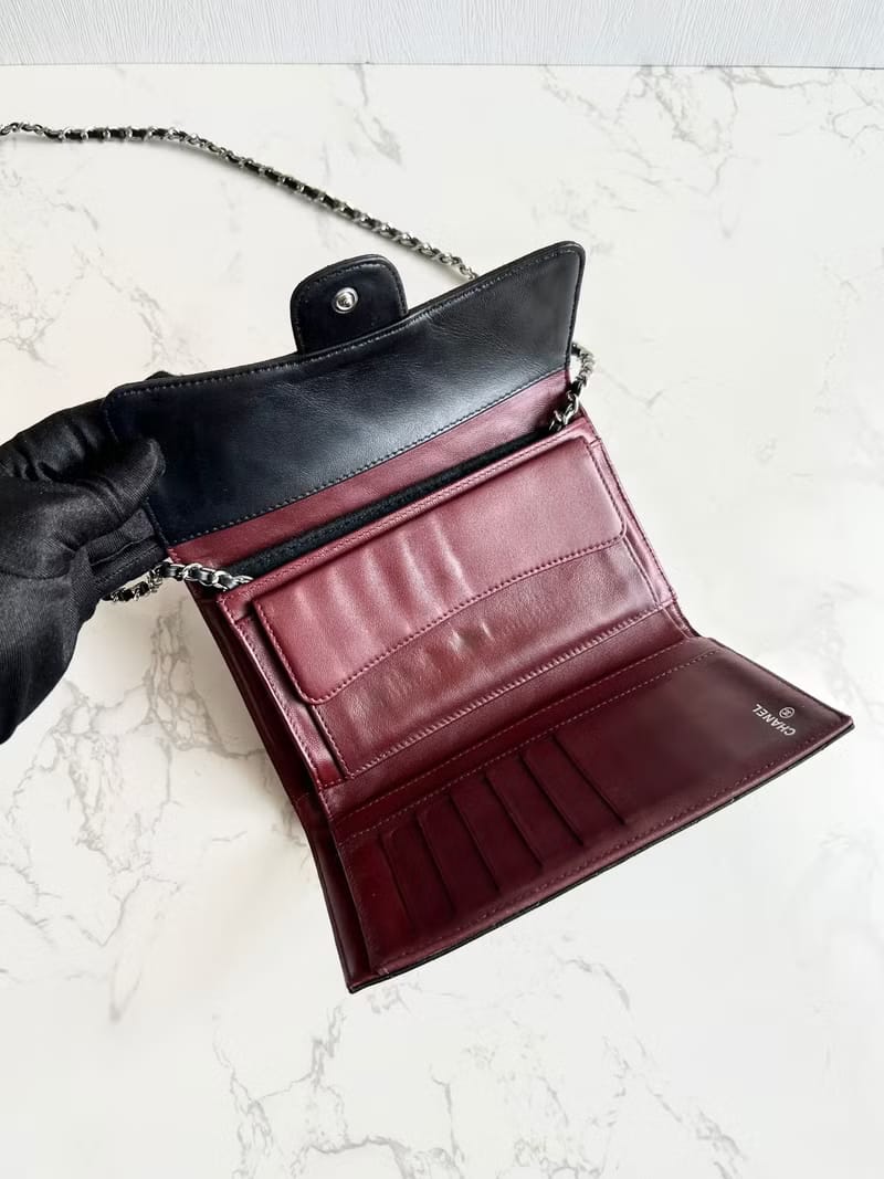 Chanel black WOC leather side bag/oblique bag/long clip