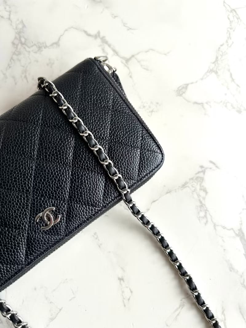 Chanel black WOC leather side bag/oblique bag/long clip