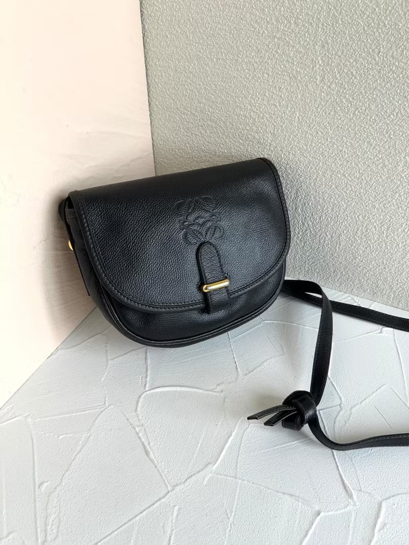 Loewe black and gold saddle side backpack/oblique backpack/shoulder bag