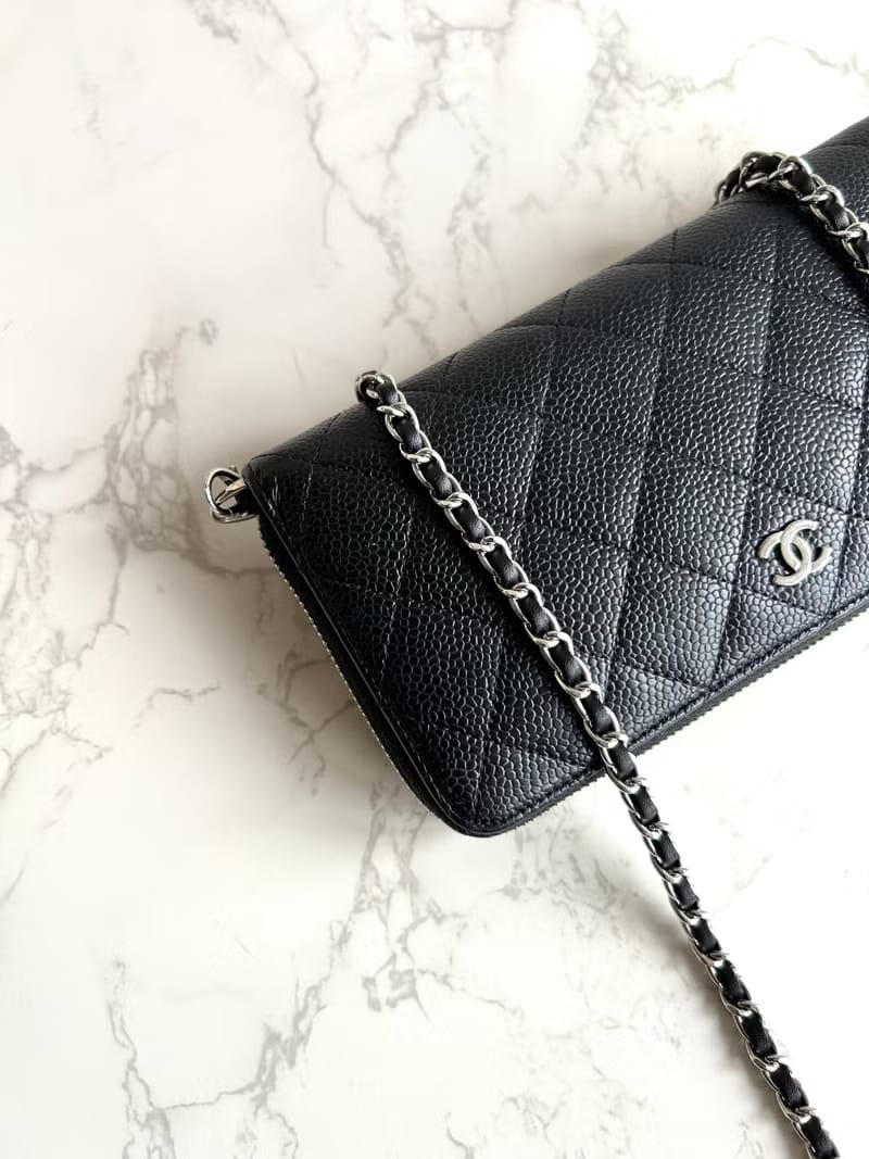 Chanel black WOC leather side bag/oblique bag/long clip