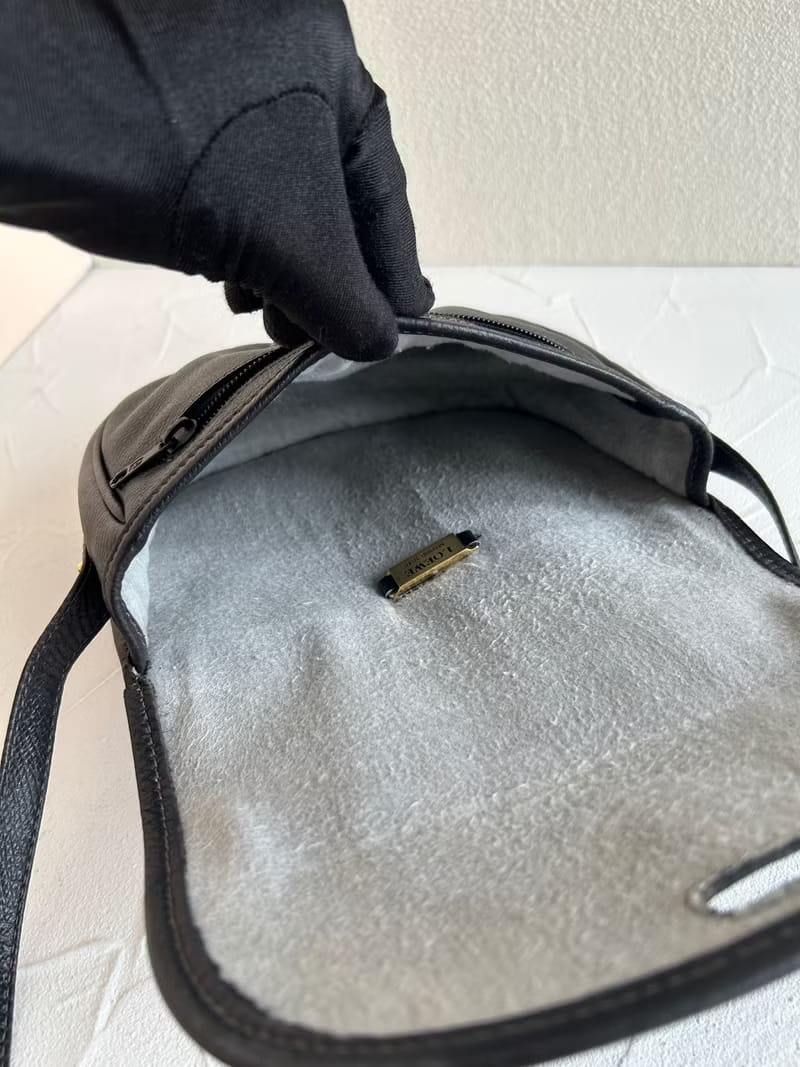 Loewe black and gold saddle side backpack/oblique backpack/shoulder bag