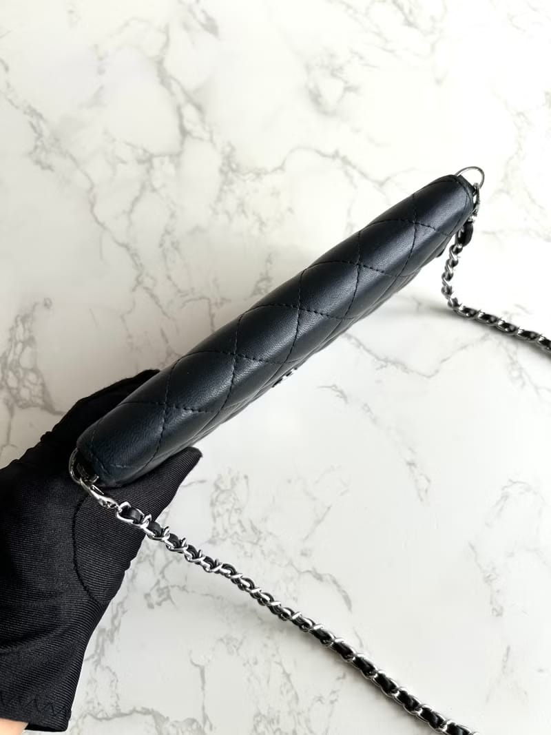 Chanel black WOC leather side bag/oblique bag/long clip