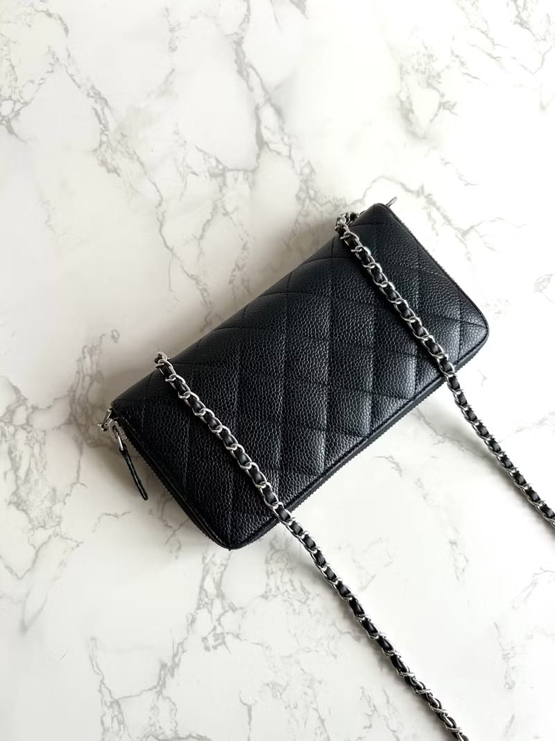 Chanel black WOC leather side bag/oblique bag/long clip