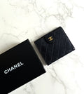 Second-hand Chanel double-sided caviar leather black short wallet